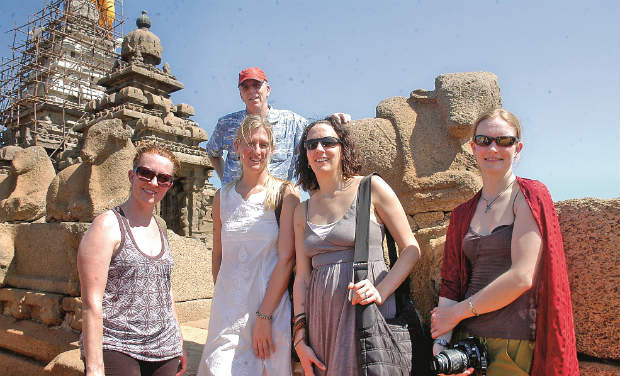 Foreigners posing in front of the shore temple in Mamallapuram -DC Foreigners posing in front of the shore temple in Mamallapuram -DC